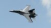 Singapore -- A Sukhoi SU-30 fighter jet from the Royal Malaysian Air Force performs a slow fly past during the Singapore Airshow at Changi exhibition center in Singapore, February 16, 2016