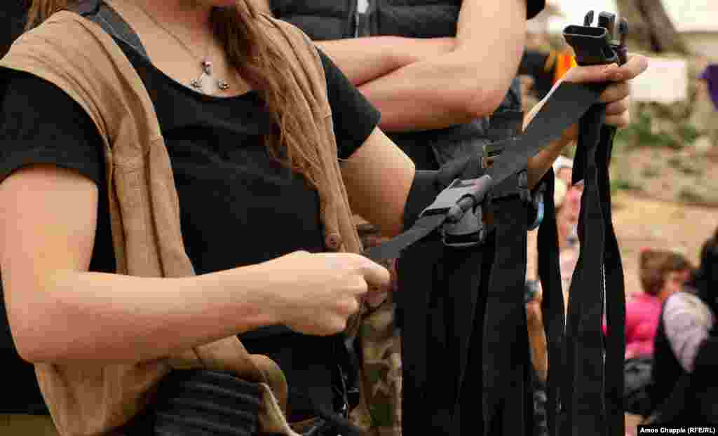 Straps and buckles come from the discarded life jackets that pile up on the beach on Lesbos.&nbsp;