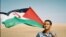 Сахариец с флагом Сахарской Арабской Демократической республики