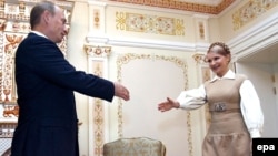 Архівне фото 2 жовтня 2008 р. Цього дня Тимошенко і Путін підписали меморандум, що перехід на ринкові ціни протриває три роки