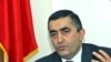 Armen Rustamian, announces the Amenian Revolutionary Federation's departure from the governing coalition on April 27, 2009.