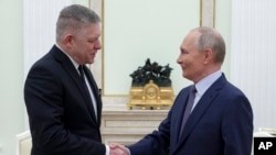 Роберт Фицо менен Владимир Путин. 