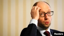 Ukrainanyň premýer-ministri Arseniý Ýatsenýuk.