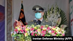 Ирандын коргоо министри Амир Хатами Фахризаденин тажыясында.