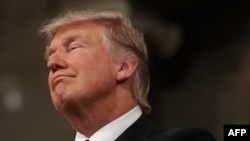 ИМА - Президенти ИМА Доналд Трамп ҳангоми нахустин суханронӣ дар ҷаласаи муштараки ҳарду палатаи Конгресс. Вашингтон, 28 феврали соли 2017.