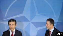 Бідзіна Іванішвілі й Андерс Фоґ Расмуссен 