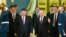 Russian President Vladimir Putin (center right) welcomes his Chinese counterpart, Xi Jinping (center left), for talks at the Kremlin in June. 