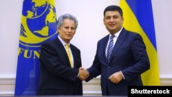 Прем'єр-міністр України Володимир Гройсман і перший заступник директора-розпорядника МВФ Дейвід Ліптон. Київ, 13 вересня 2017 року (ілюстраційне фото)