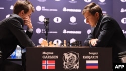 Магнус Карлсен і Сергій Карякін, архівне фото
