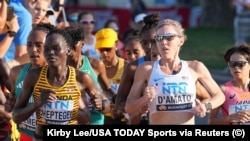 Ребекка Чептегеи (солдо) Будапешттеги марафон учурунда. Венгрия. 26-август, 2023-жыл
