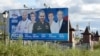 An election campaign banner showing candidates from United Russia is seen in Murmansk.