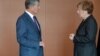 Президент Алмазбек Атамбаев менен Германия канцлери Ангела Меркел. 