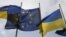 Ukraine -- Ukrainian and EU flags fly in front of the Presidential Administration in Kyiv, April 7, 2016