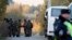 Russia -- Russian police block the road to the house of Amiran Georgadze who is suspected in murdering four people, in the village of Timoshkino, some 27 km from the town of Krasnogorsk in the Moscow region, October 20, 2015
