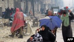 Алеппонун уруш аймактарынан качкандар.  13-декабрь, 2016-жыл. 