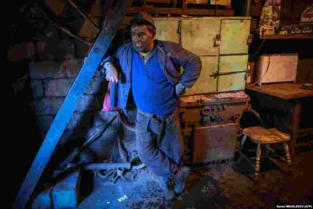 Ferenc Balog, 44, finishes his shift at the Lonea coal mine.