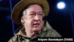 Mikhail Yefremov performs in a play at a theater in Moscow on January 12.