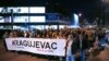 Antigovernment protesters take to the streets in the the southern Serbian town of Kragujevac on March 23.