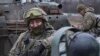 A Ukrainian soldier rests before going to the front line in the Donetsk region on January 28.