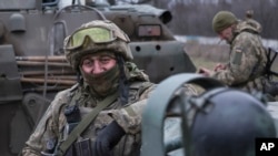 A Ukrainian soldier rests before going to the front line in the Donetsk region on January 28.