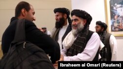 Толибон вакиллари Қатар пойтахти Доҳада ўтказилган музокараларда. 2020, 29 февраль.