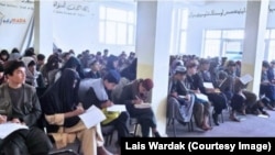 دانش آموزان در حال نوشتن برگه‌های امتحان.