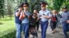 Полиция задерживает молодую женщину в центре Алматы, где ожидался несанкционириованный митинг. 10 июня 2019 года.
