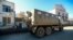 NAGORNO-KARABAKH -- An Azeri military truck drives along a street in the town of Hadrut, November 25, 2020