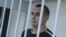 Украинский режиссер Олег Сенцов в зале суда в Москве. 7 июля 2014 года. 