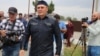 CHECHNYA -- Oyub Titiyev, the head of regional branch of Russian human rights group Memorial, leaves a jail after being released on parole, in Argun, June 21, 2019