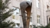 Armenia -- A statue symbolizing the national currency, the dram, outside the Central Bank building in Yerevan.