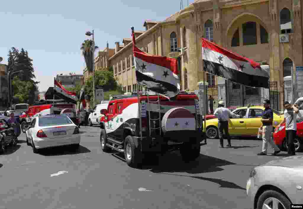 Сторонники президента Асада на улицах Дамаска