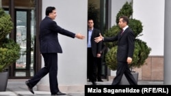 Президент Саакашвили менен "Грузия кыялынын" лидери Бидзина Иванишвили. Тбилиси, 9-октябрь, 2012.