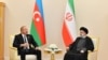 Azərbaycan Prezidenti İlham Əliyev və İran Prezidenti  Seyid Ibrahim Rəisi, Aşqabad,  28 noyabr 2021 