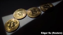 Адна з найбольш вядомых крыптавалютаў Bitcoin, ілюстрацыйнае фота