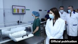 Armenia - Health Minister Anahit Avanesian visits the Armenian company Liqvor producing Sputnik Light vaccine, Yerevan, December 6, 2021.