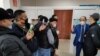 Supporters of another activist with links to the banned Koshe (Street) Party outside an Almaty courtroom on February 23. 