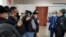 Supporters of another activist with links to the banned Koshe (Street) Party outside an Almaty courtroom on February 23. 