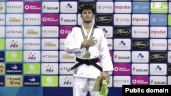 Эмомалӣ Нуралӣ дар рақобат барои нишони биринҷӣ аз Муҳриддин Тиловови узбекистонӣ ноком шуда, дар натиҷа мақоми панҷумро соҳиб шуд 