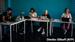 Employees of Navalny's Anti-Corruption Foundation work in their office in Moscow. (file photo)