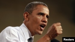 Президент США во время выступления в рамках избирательной кампании в Лас-Вегасе, 12 сентября 2012 года.  