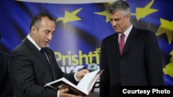 President Hashim Thaci (right) has said that he would give Ramush Haradinaj a formal mandate to try to form a government once he could show he had a deal showing a majority coalition was in place.
