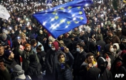 Дэманстранты зьбіраюцца на пратэст каля будынку парлямэнта ў цэнтры Тбілісі. 29 лістапада 2024 году