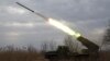 A multiple-launch rocket system based on the BM-21 "Grad" fires a rocket near the front line in the Donetsk region on February 27.