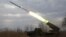 A multiple-launch rocket system based on the BM-21 "Grad" fires a rocket near the front line in the Donetsk region on February 27.