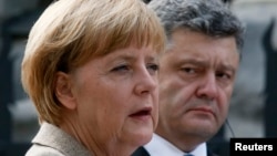 Президент України Петро Порошенко та канцлер Німеччини Анґела Меркель, Київ, серпень 2014 року