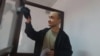 Гражданский активист Макс Бокаев в суде, где решается вопрос об избрании ему меры пресечения. Атырау, 3 июня 2016 года.