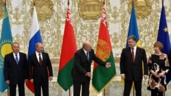 Орусия президенти Владимир Путин, Беларус президенти Александр Лукашенко жана Украинанын президенти Петро Порошенко