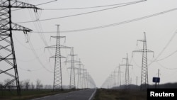 The Russian-installed administration in the Kherson region said the outages were the result of an attack by the Ukrainian side on a highway that damaged three concrete poles of high-voltage power lines. (file photo)
