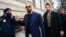 Andrew Tate (center) and Tristan Tate (second right) leave a courthouse in Bucharest on December 22, 2023.